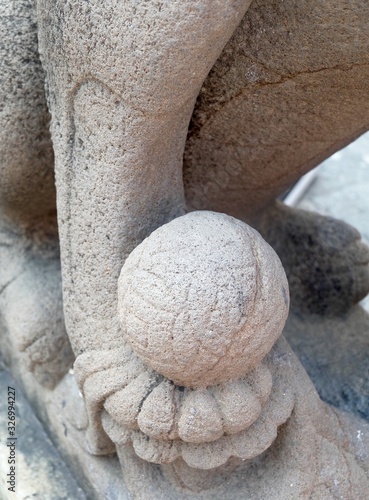 Lion Sculpture with A Ball in Wat Phra Kaew, Thailand