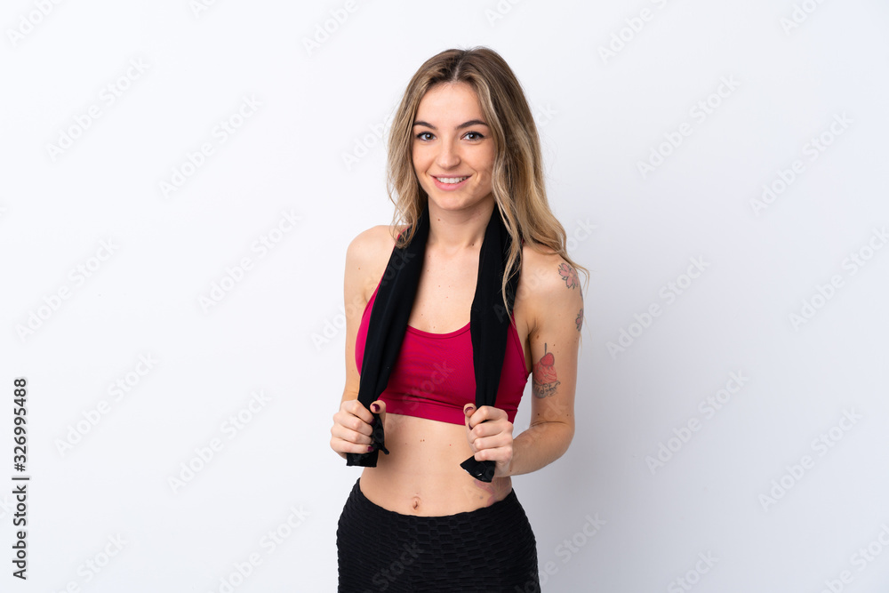 Young sport woman over isolated white background with sport towel Young sport woman over isolated white background with sport towel