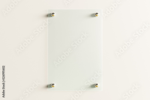 Foto Blank vertical transparent glass sign plate on the white wall