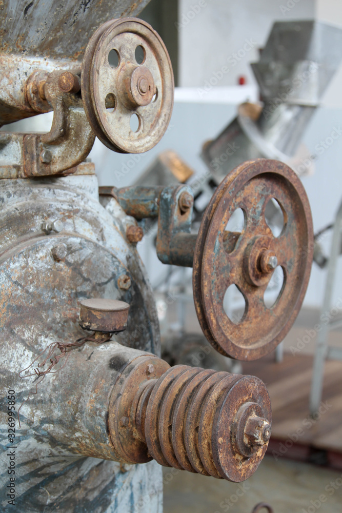 Old rusty machine that is not used in abandoned factory. Old rusty machine that is not used in abandoned factory.