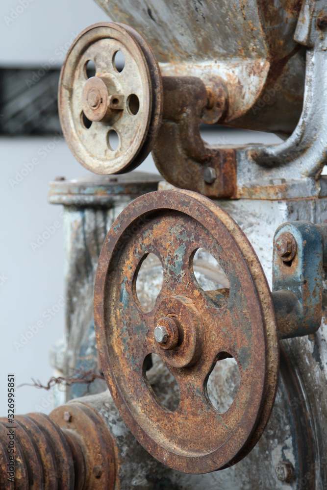 Old rusty machine that is not used in abandoned factory. Old rusty machine that is not used in abandoned factory.