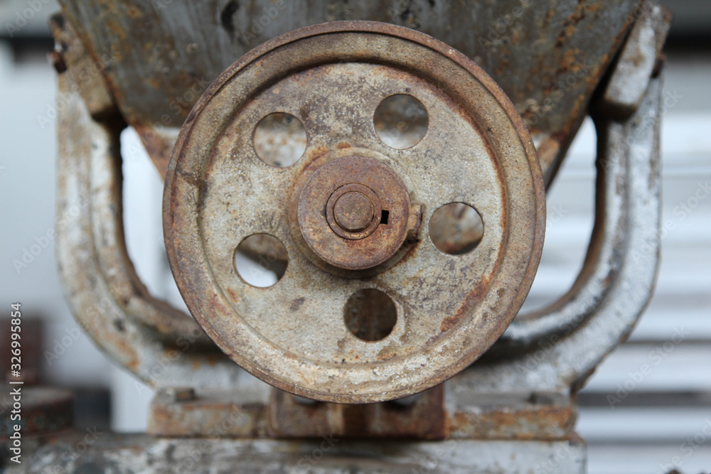 Old rusty machine that is not used in abandoned factory. Old rusty machine that is not used in abandoned factory.