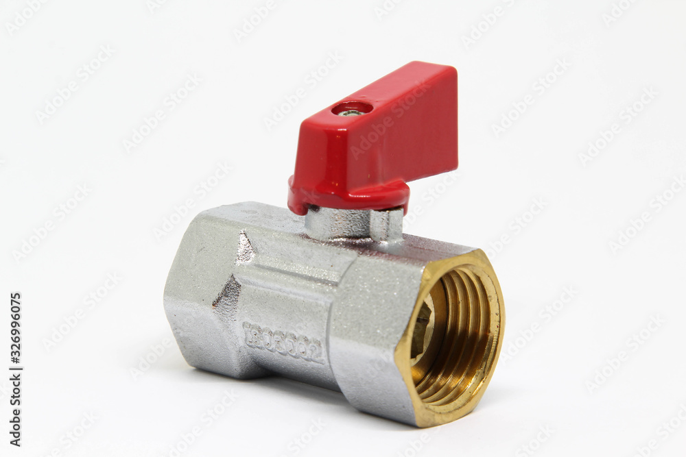 Brass ball valve with red handle on white background. Brass ball valve with red handle on white background.