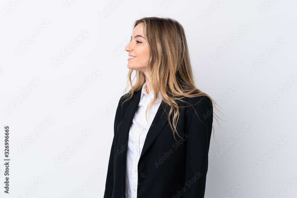 Young business woman over isolated white background looking to the side Young business woman over isolated white background looking to the side