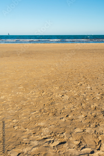 Valencia Beach  malvarrosa  at noon with blue sky