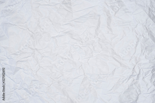 white wrinkled sheet of paper