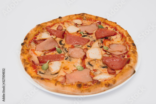 whole pizza with different meat toppings