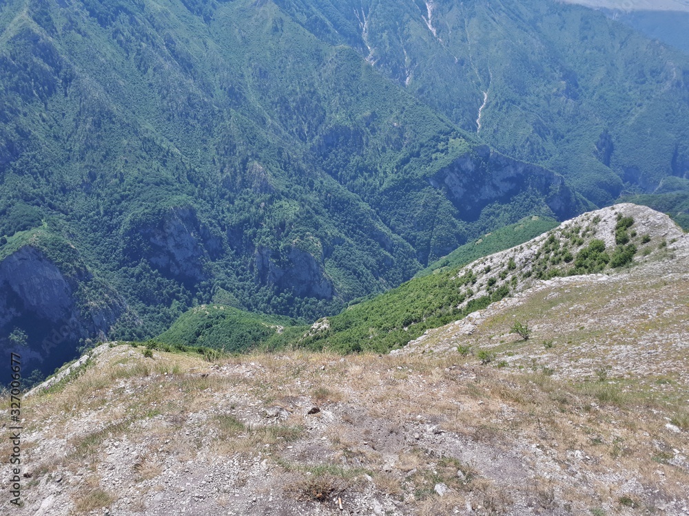 Deep canyon of river Rakitnica between two mountains Deep canyon of river Rakitnica between two mountains