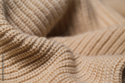 Knitted fabric wool texture close up as a background. photo