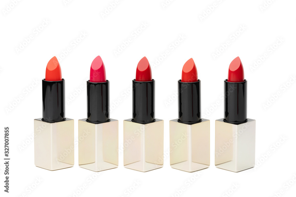 Obraz premium Set of lipstick isolated on white background. Red, Pink and Orange color in various toned.
