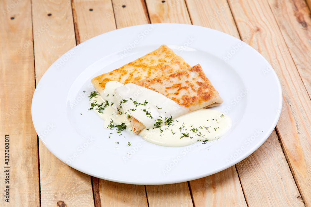 stuffed pancakes with sour cream stuffed pancakes with sour cream