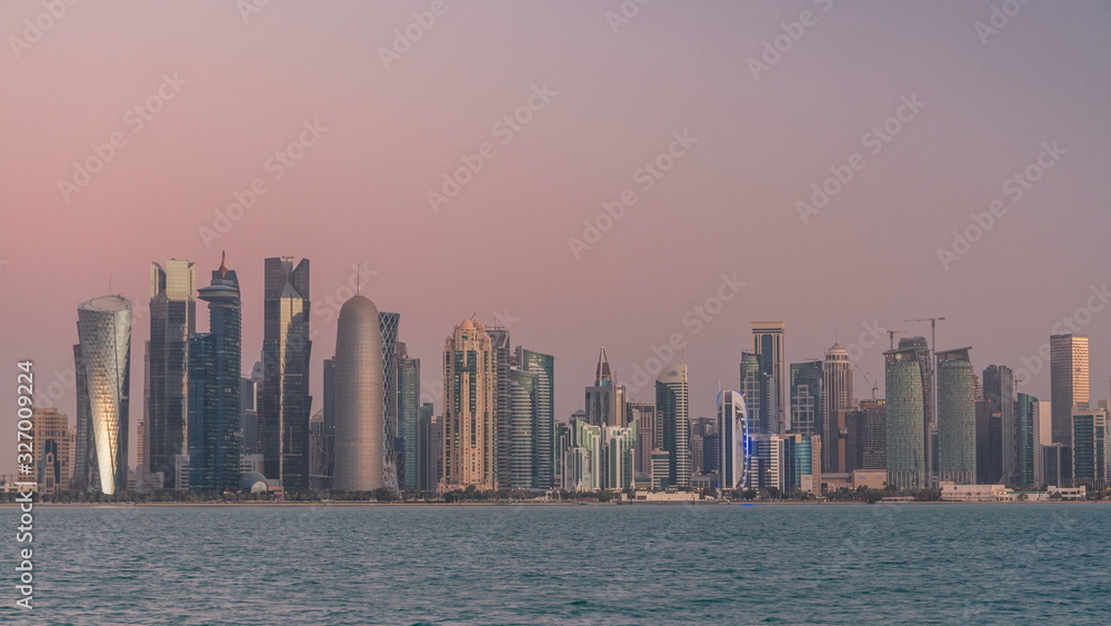 Skyline of Doha night to day transition timelapse in Qatar