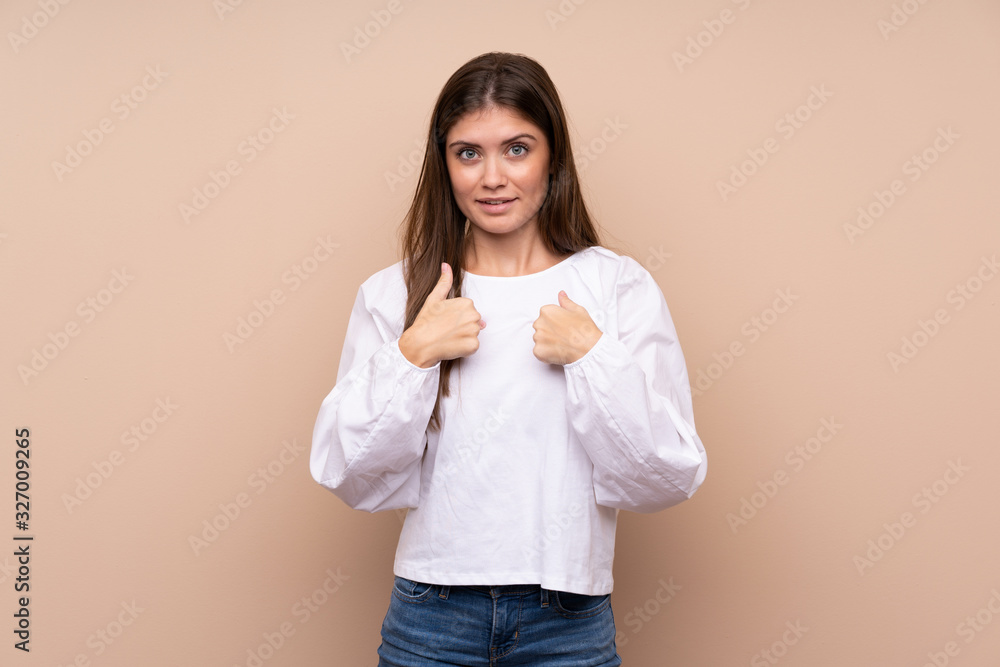 Young girl over isolated background with surprise facial expression Young girl over isolated background with surprise facial expression