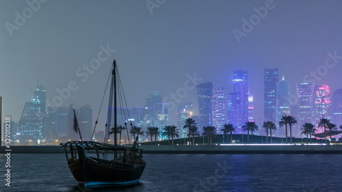 A panoramic view of the old dhow harbour night timelapse in Doha  Qatar  with