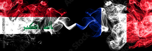 Iraq, Iraqi vs France, French smoky mystic flags placed side by side. Thick colored silky smokes flags together.