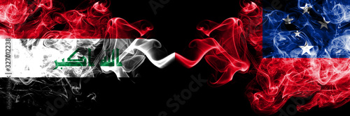 Iraq, Iraqi vs Samoa, Samoan smoky mystic flags placed side by side. Thick colored silky smokes flags together.