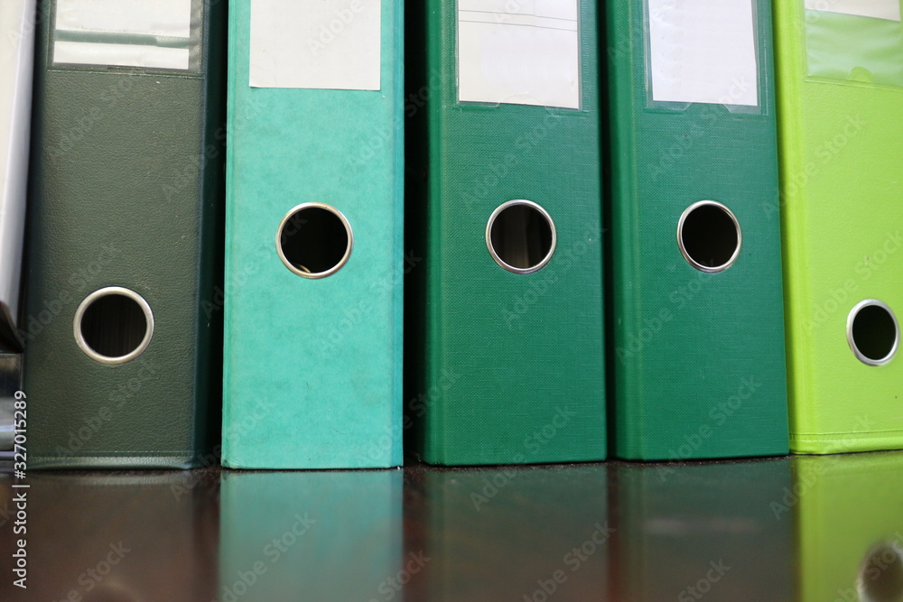 green office folders on the table green office folders on the table