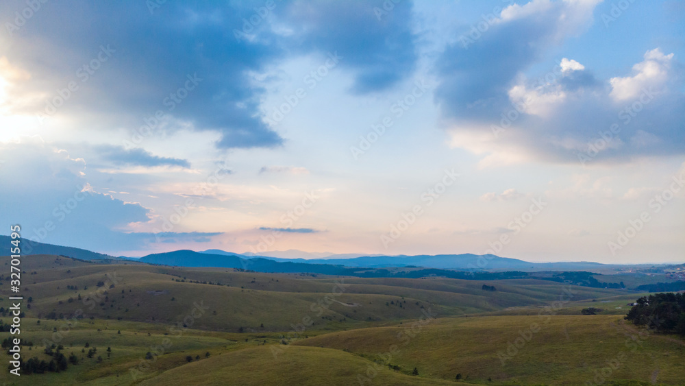 landscape with mountains and clouds