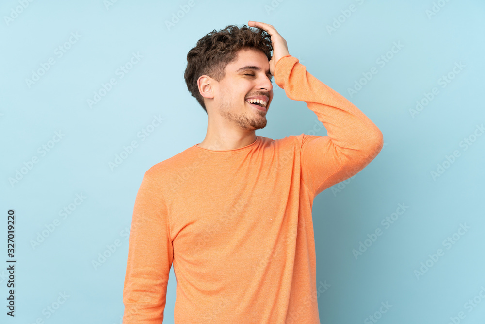 Caucasian man isolated on blue background has realized something and intending the solution Caucasian man isolated on blue background has realized something and intending the solution