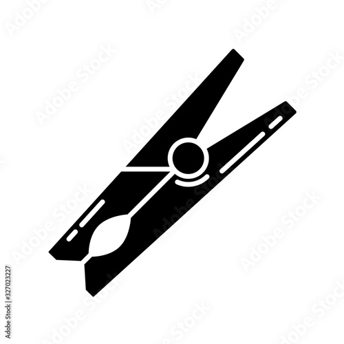 Clothes pin black glyph icon. Wooden clothespin, household clothing clamp, clean garment drying tool. Washing attribute, laundry item. Silhouette symbol on white space. Vector isolated illustration