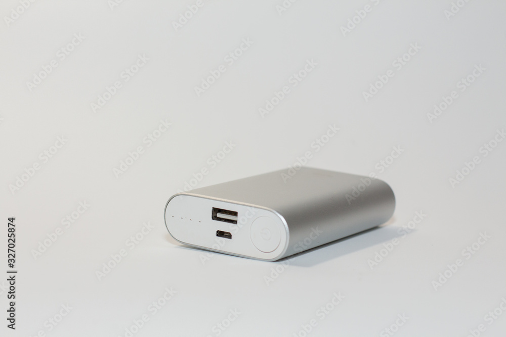 Fototapeta premium gray power bank on a white background