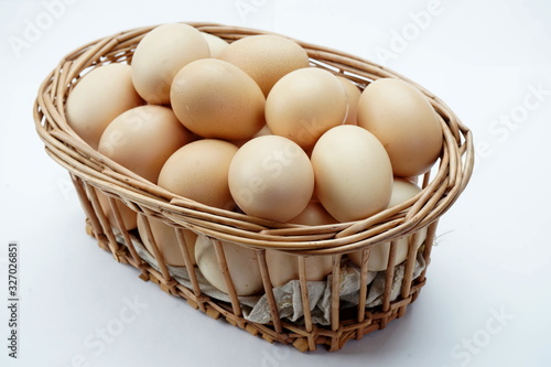 Wallpaper Mural Basket with eggs isolated on a light background Torontodigital.ca