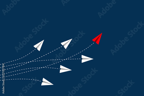 Leadership and competition concept, with red paper plane leading among white on blue background.