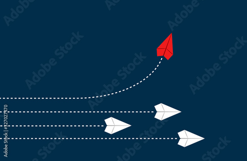 Think differently concept. Red airplane changing direction. New idea, change, trend, courage, creative solution, innovation, business for innovative and unique way concept.