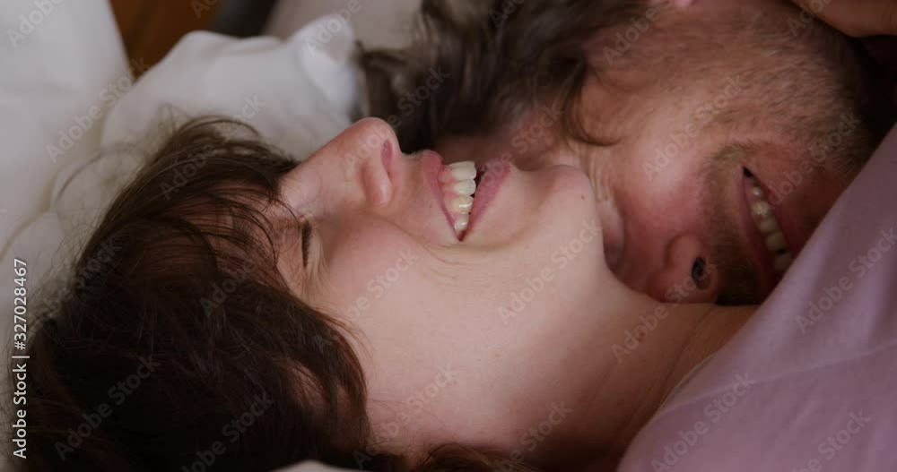 Caucasian couple embracing each other at home Caucasian couple embracing each other at home