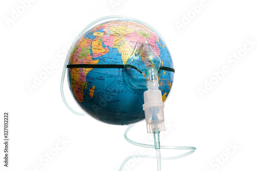 Save The World. Conceptual image, earth globe with an inhaler mask, isolated on a white background. Human Epidemic Danger.