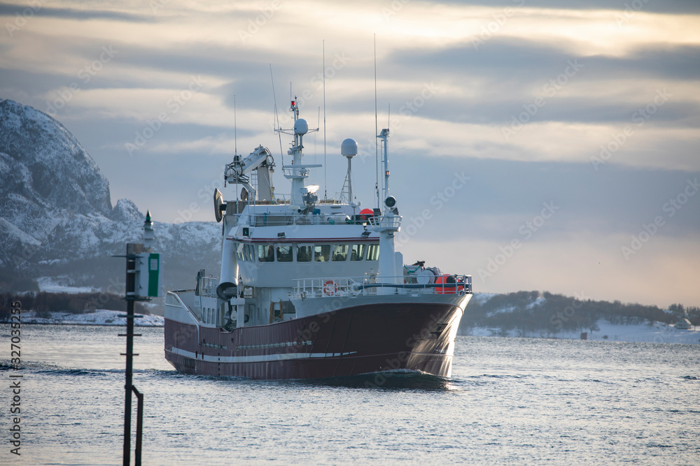 Fishing boat through Brønnøysundet, Nordland county Fishing boat through Brønnøysundet, Nordland county