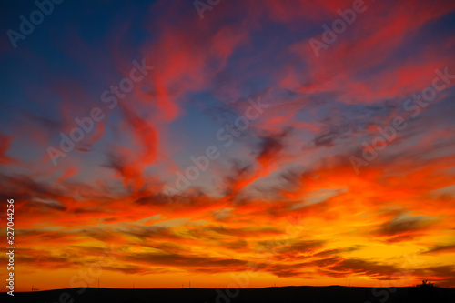 Beautiful evening sky with clouds. Colorful multicolored sunset