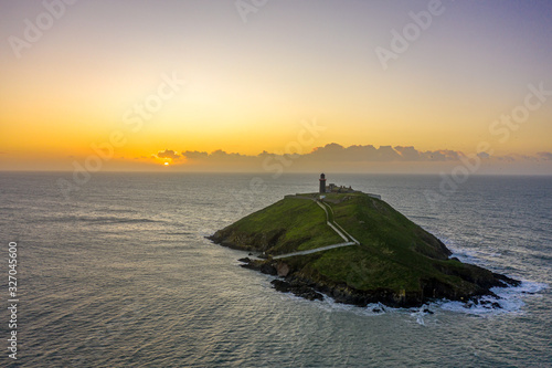 Ballycotton Lighthouse is situated on the steep sloped on a Island approximately 2 km from Ballycotton Village. One of only two Black Lighthouses in Ireland. photo