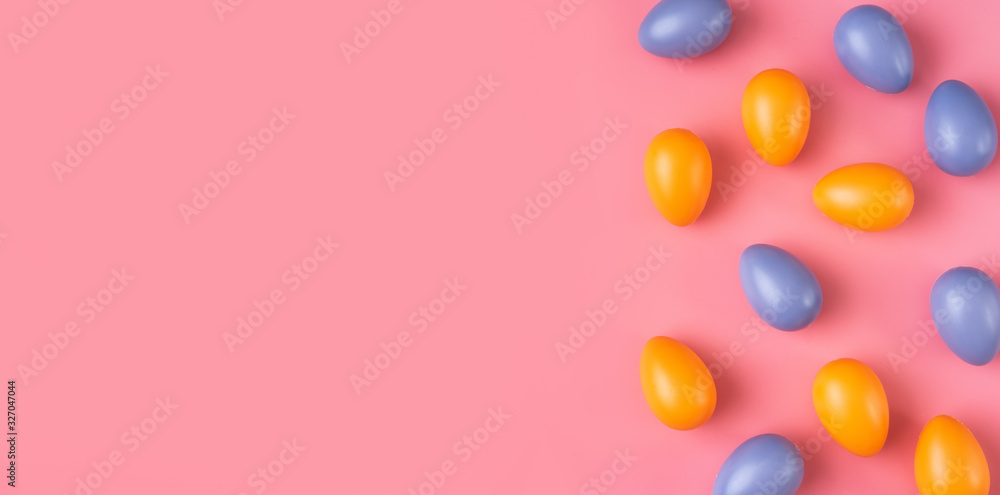 Colorful Easter Eggs on bright pink background Colorful Easter Eggs on bright pink background