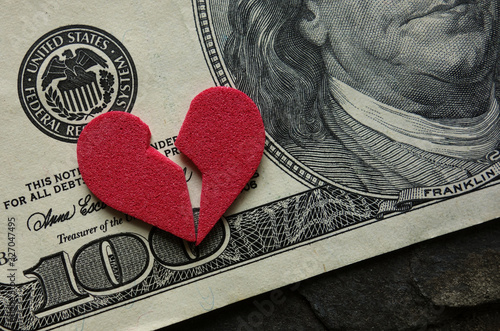 Obraz na płótnie Cracked heart on money