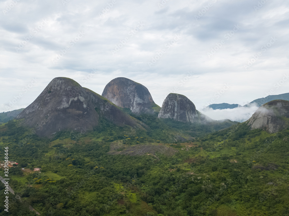 Aerial Photography of a tropical landscape, with forest and mountains Kumbira forest reserve , huge geologic rock elements