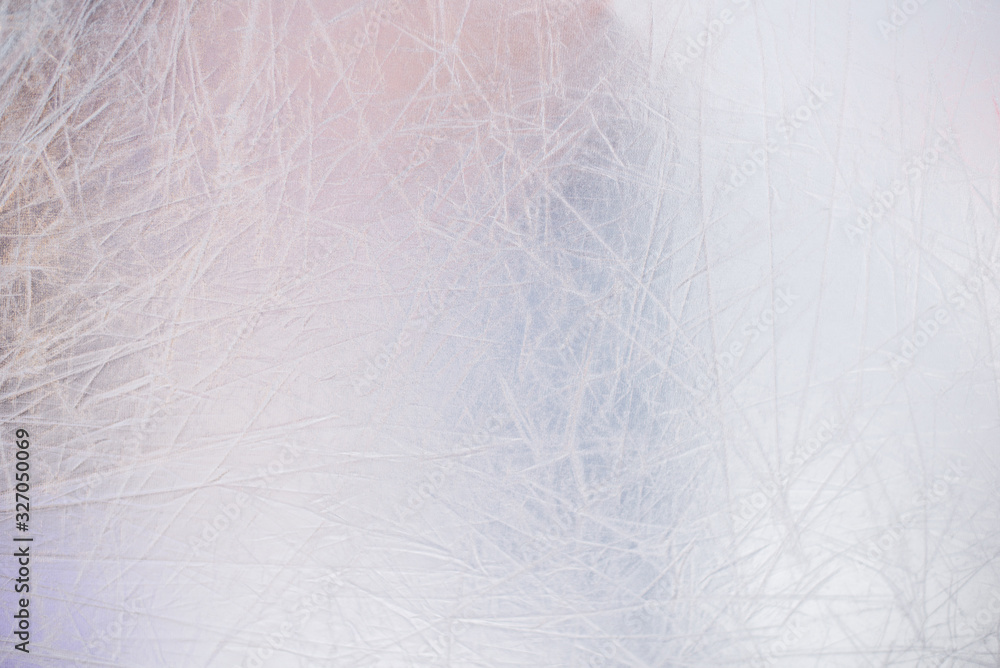 Silver metal background. The texture of the folds light grey glitter Silver metal background. The texture of the folds light grey glitter