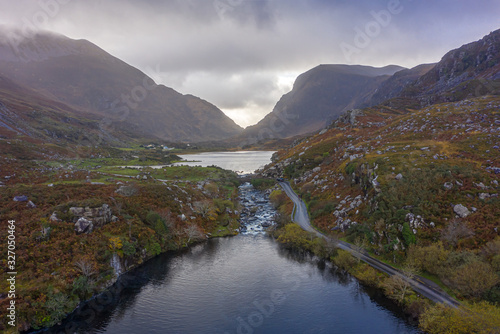 The Gap of Dunloe is a narrow mountain pass running north-south in County Kerry, Ireland, that separates the MacGillycuddy's Reeks mountain range in the west, from the Purple Mountain Group range. © Ire DronePhotography