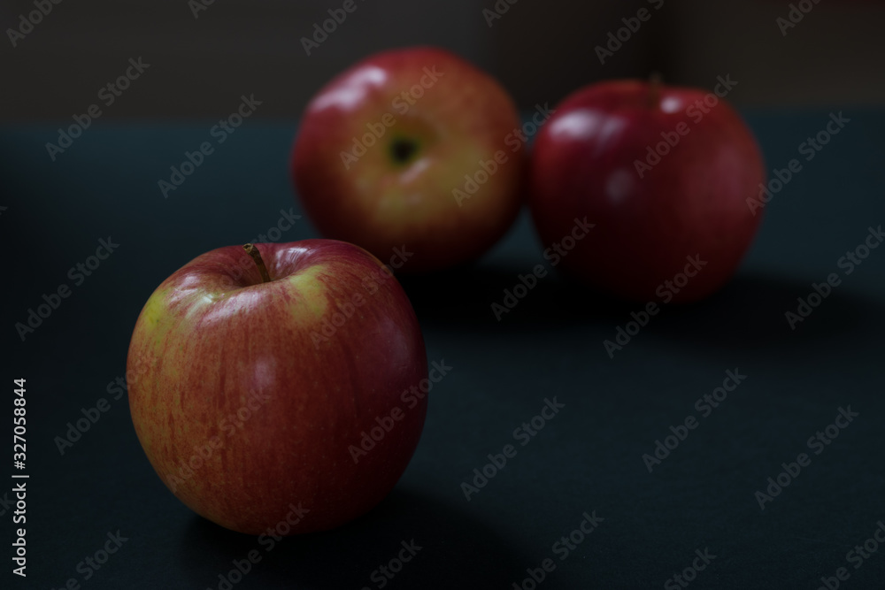 red apples close-up on a dark background red apples close-up on a dark background