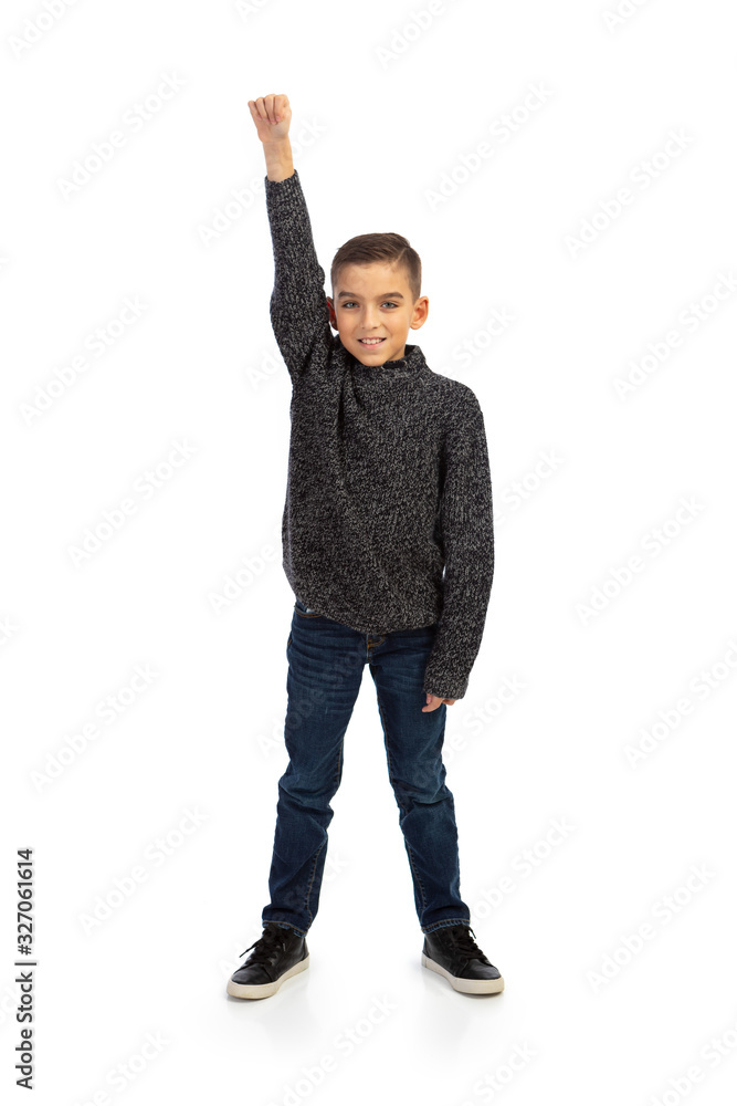 Naklejka premium Kids: Strong Boy With Fist In The Air