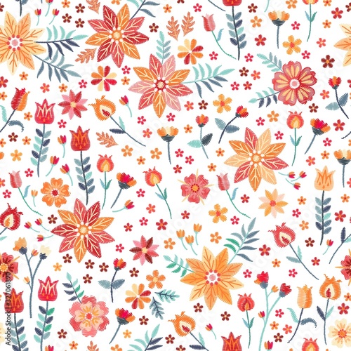 Beautiful embroidery flowers on white background. Floral seamless pattern with folk motives.