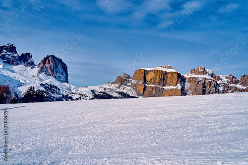 Beautiful panoramic view to the Sellaronda - the largest ski carousel in Europe - skiing the four most famous passes in the Dolomites (Italy), extraordinary snowy peaks of the dolomites, southern alps photo