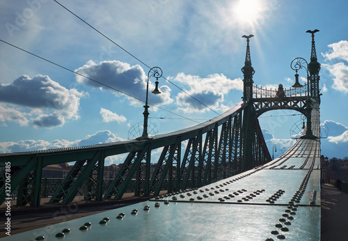 Liberty bridge in strong backlight in Budapest. The hungarian name is Szabadsag hid, this is the shortest bridge of Budapest in Hungary. photo