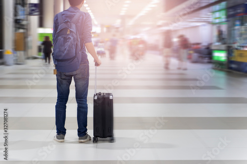luggage holder on suitcase or bag with TRAVEL INSURANCE ,traveling luggages in an airport terminal,before passenger and plane flying over sky,Can be used for montage or display your products