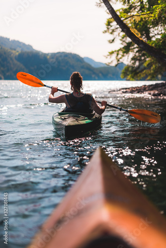 фотографія Girl in Kayak on Lake