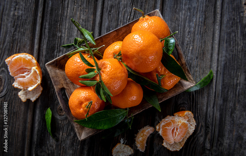 Freshly picked bunch of mandarins photo