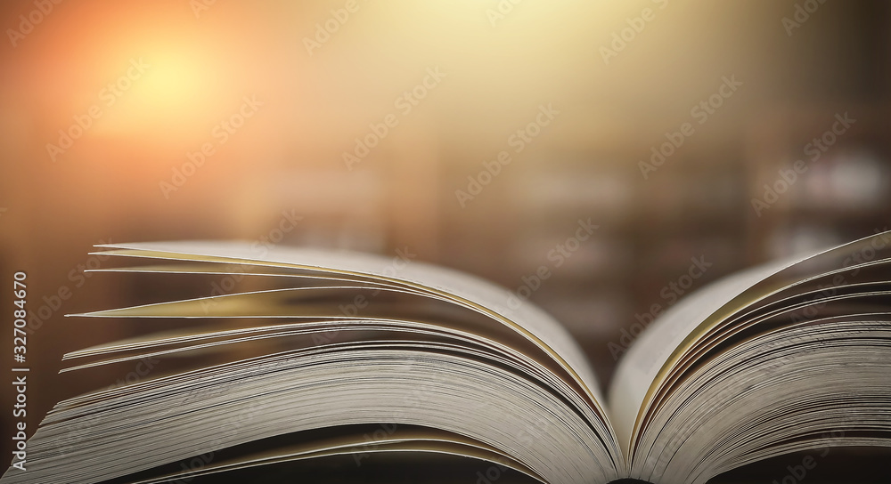 Abstract gold magic book on wooden background Abstract gold magic book on wooden background