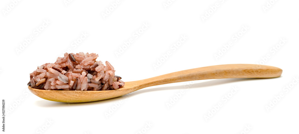 Brown rice berry or Oryza sativa with spoon wooden isolated on white background Brown rice berry or Oryza sativa with spoon wooden isolated on white background