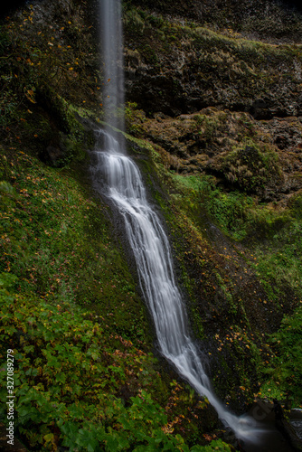 Long exposure of a waterfall at Silver Falls State Park in the Autumn