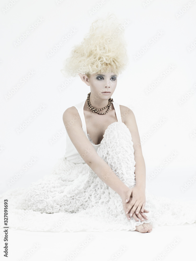 Stylish picture of a beautiful young girl elf with stylish hairstyle and makeup. Stylish picture of a beautiful young girl elf with stylish hairstyle and makeup.